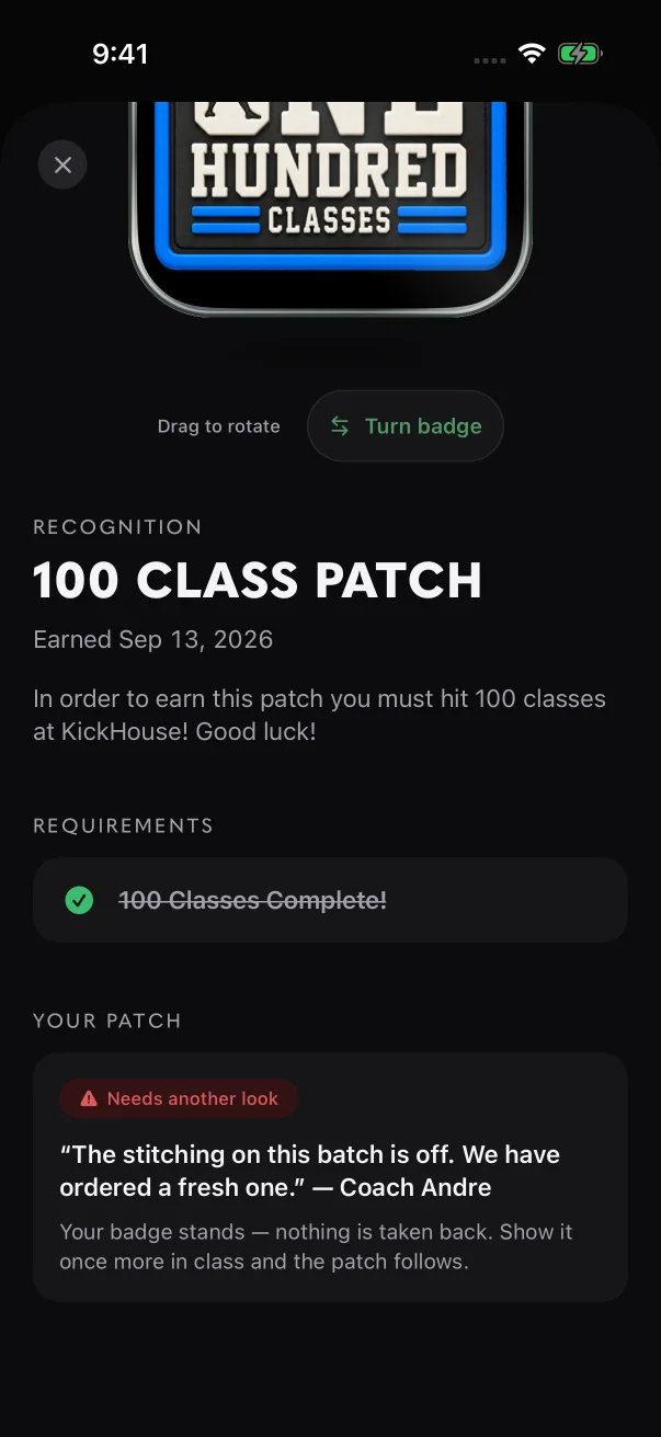 Your coach's words are quoted under the red chip, and the badge stays earned.